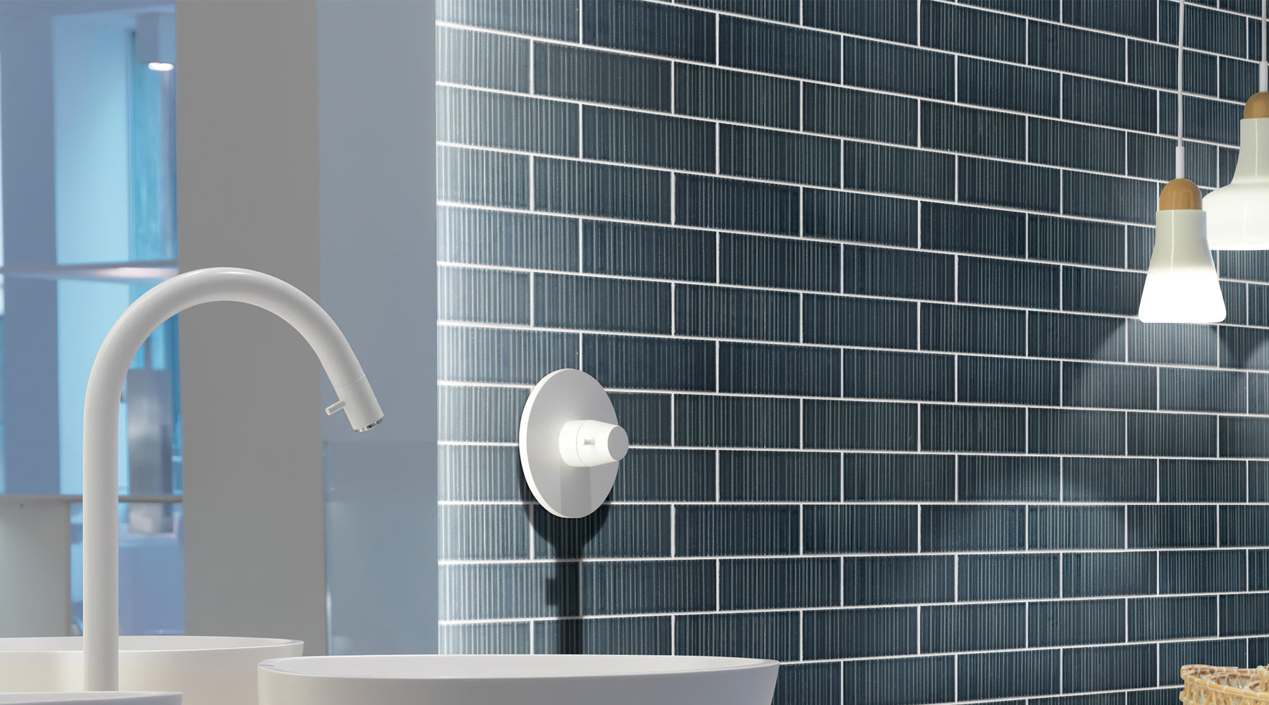 An image of a white faucet and sink in the left foreground and blue tile on the wall in the background.